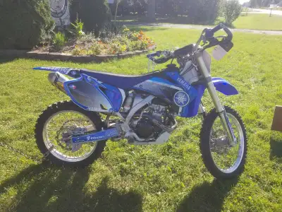 2009 Yamaha yz250f with a big bore kit, fresh rebuild with 1 hr of brake in time, new graphics, very...