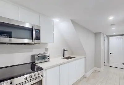 One-bedroom unit with a separate entrance, central heating/cooling, newly renovated, within walking...