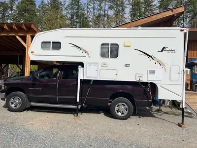 Mint condition Snowbird 11' truck Camper Stored undercover all its life Dinette slide with roll out...