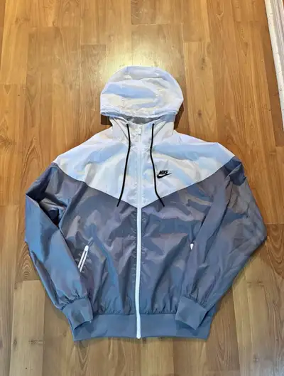 White and grey nike windbreaker, View more