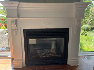 New Price! Beautiful gas fireplace and custom built mantle, View more