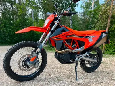 ONLY 7 hours! Bought new last year and no time to ride. The bike is in perfect/NEW condition. No scr...