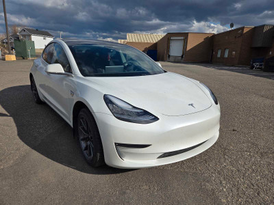 Tesla SR+ 2020
