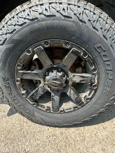 Brand new cooper tires on sports rims only selling because I got 20 inch stock rims meant for my tru...