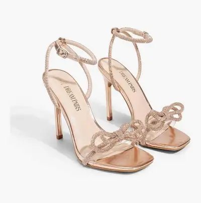 Step into style and sophistication with these glamorous Dream Pairs women’s slingback sandals. Featu...