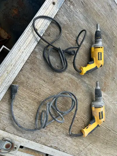 Two DEWALT drywall screw guns, work great just use cordless now. $20 each, $35 for both