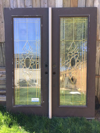 Double exterior entry door with leaded ornament glass insert