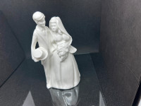 Royal Doulton Bride and Groom in mint condition.