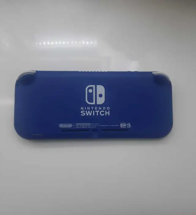 Nintendo Switch Lite Blue à vendre in Nintendo Switch in Laval / North Shore - Image 5