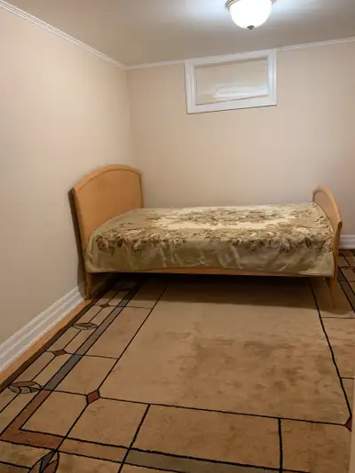 Furnished small one bedroom in a subbasement