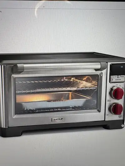 ALMOST BRAND NEW WOLF GOURMET TOASTER OVEN, View more