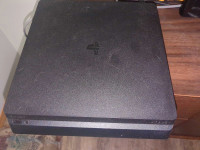 Ps4  Slim 1TB with 2 controllers and games