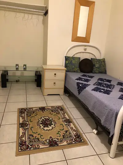 Private furnished room in a 2 rooms basement apartment, washroom and kitchen needs to share, in Morn...