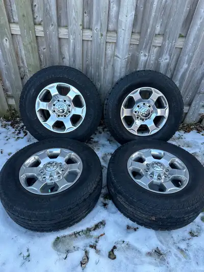 Selling a Set of OEM 18” Dodge Ram 2500/3500 Rims On Yokohama A/T Tires. Tires have OK tread left Ca...