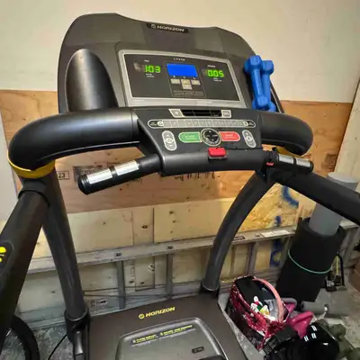 Get ready to elevate your fitness game with this Horizon treadmill, designed to bring the gym experi...