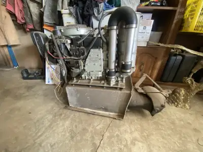 2 cylinder 2 stroke motor with jet drive.. complete just need battery and fuel source came out of a...