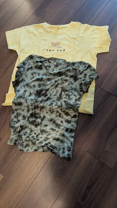 Get two stylish t-shirts in one go! The yellow Cape Cod tee is bright and cheerful, while the tie-dy...