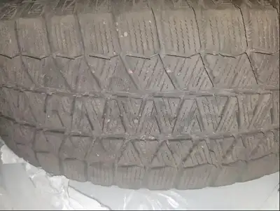 Blizzak tires mounted on rims. Nothing wrong with them, just sold the car that they belonged to. Lot...