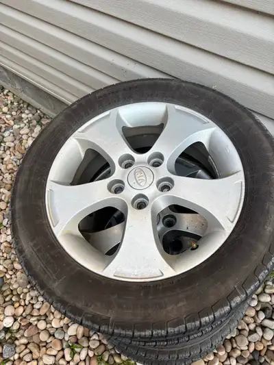 Set of for rims and tires Rims off of 2010 Kia forte bolt pattern 5 X 4.5” Tires all season 205/ 55...