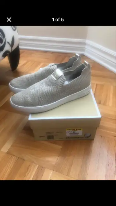 Like new worn only once or twice MK sneaker in size 8.5! Retail paid $160 + tax