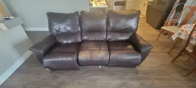Matching leather reclinng love seat and sofa. Left side recliner on sofa is broken and only reclines...