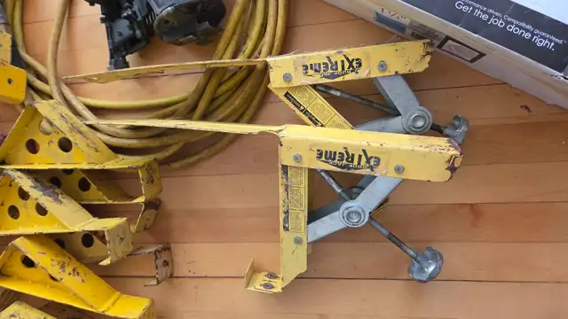 roofing supplies  Hitachi nailer in photo has been sold