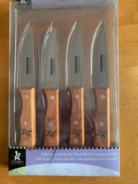 Brand new 4 pieces steak knifes set with natural wood handles