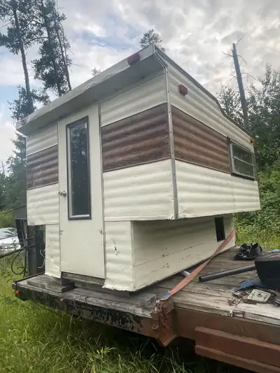 8 foot slide in truck camper Selling as is where is Roof was done, does not leak No stands This is a...