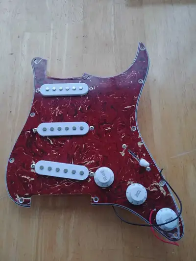 Stratocaster Style loaded pickguard. Not US made, not Japanese made, all parts and components to ins...