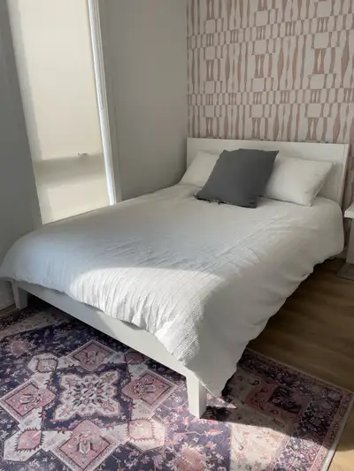 This is a IKEA Nordli queen bed frame, offering both style and functionality with its sleek design a...