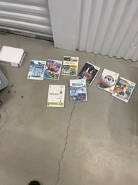 Wii console plus dozen of games 