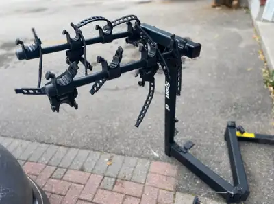 Selling a Bike Rack for 4 bikes that folds for opening the trunk door. Very heavy duty mount and bui...