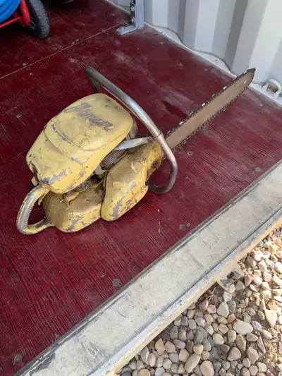 Vintage Pioneer chainsaw, View more