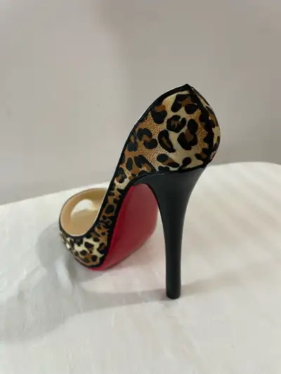 Add a touch of haute couture to your home decor with this gently loved Christian Louboutin-inspired...