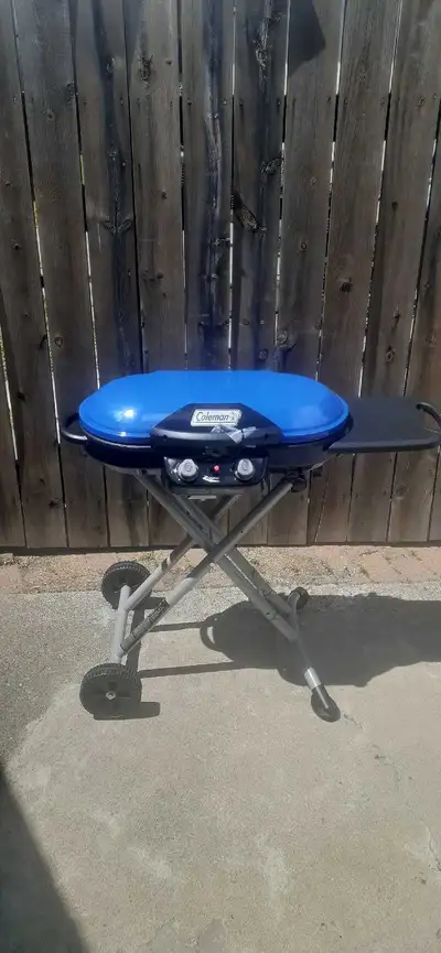 Brand new never used Coleman portable 2 burner bbq. Great for camping or fishing.