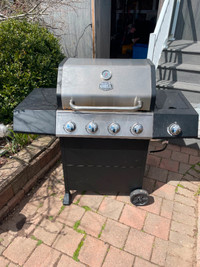 One year old BBQ grill with side burner