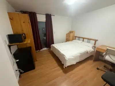 BALCONY suite with private ensuite bathroom, queen bed, desk & chair. Private ensuite fridge & micro...