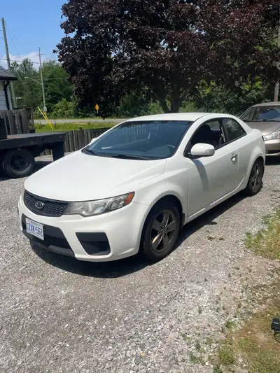 2010 Kia Forte Coup. This car is in great shape. Runs, drives and shifts perfectly. Has the 2.0 lite...