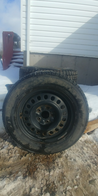 17 inch rims and tires rims are like new make great winter rims tires are 50 percent or a bit more w...