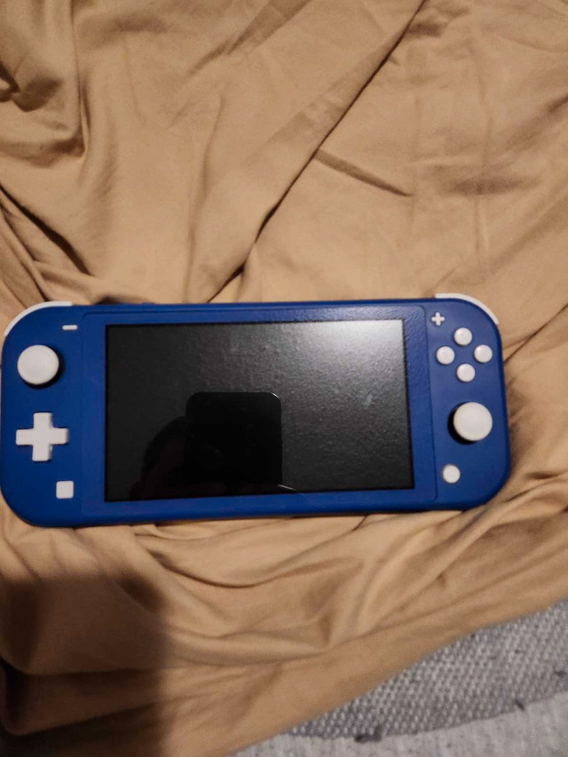 2 nintendo switch lites and games in Nintendo Switch in Grande Prairie
