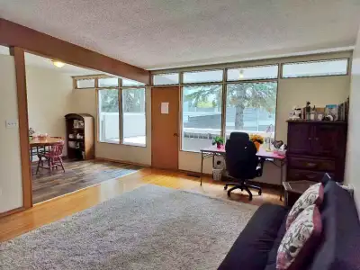 Convenient NW sunny higher bi-level with huge patio long term