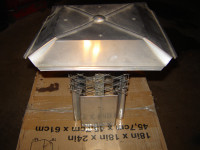Stainless steel chimney cap with clover leaf base