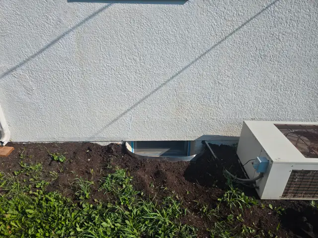 Egress window cutting & concrete work63234701761027122