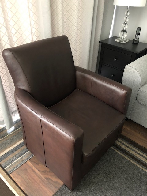BROWN LEATHER CHAIR in Chairs & Recliners in Chilliwack