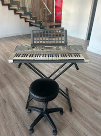 Yamaha keyboard with adjustable stand and stool $120