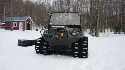 Argo 8x8 tout équipé, moteur Kohler, treuil, hitch avant et arrière, chenille avec griffe, cabine en...
