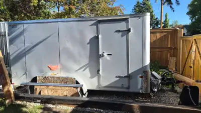 2024 14' x 8 feet enclosed, like new, low mileage, used for one move. Currently used as a storage un...