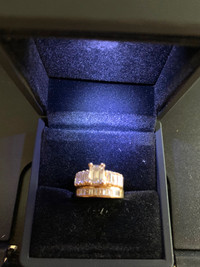 Gorgeous engagement ring w/ wedding band.  Appraised at over 21K