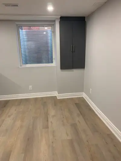 Legal one bedroom & den basement apartment