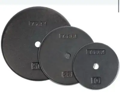 York weight plates 1” center Like New  75 cents / lbs, View more